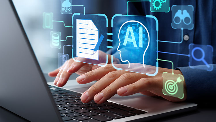 Business person using laptop computer to give instructions to AI at desk in office.
