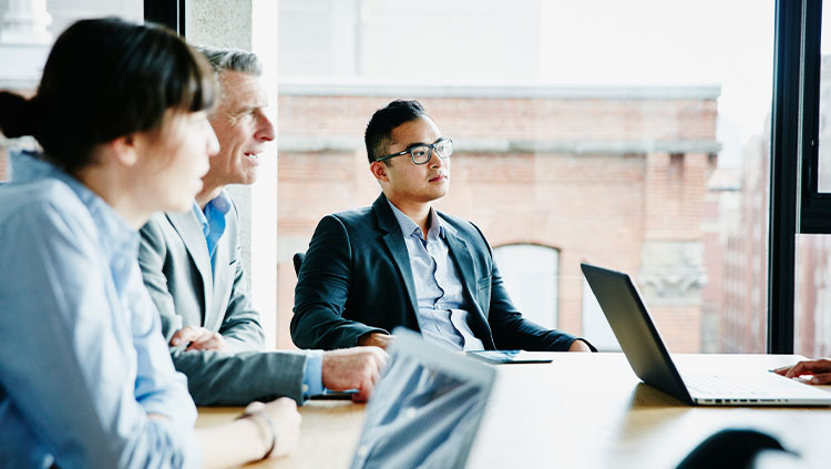 Business people listening in a meeting
