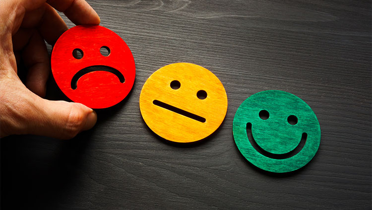 Negative customer feedback with low rating and sad face icon on digital screen