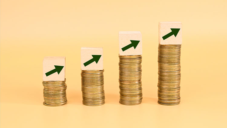 Stacks of coins arrows going up