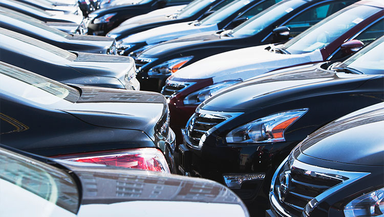 Cars parked closely together