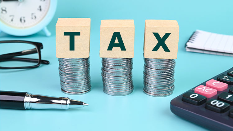 Tax sitting on coins calculator pens
