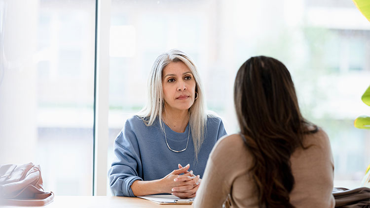 Two business people meeting serious