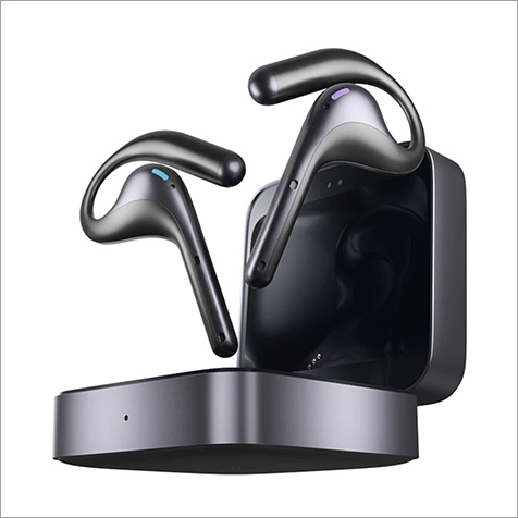 ear buds hoovering on top of charger case